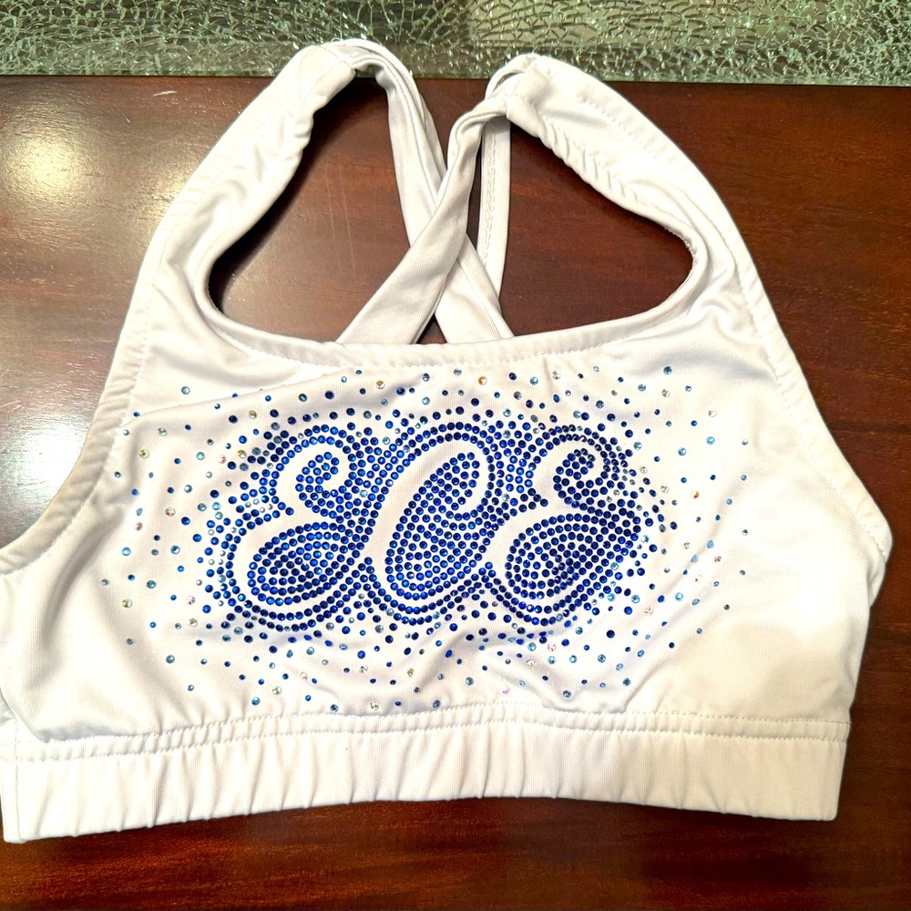 ECE girls sports bra size YM blue rhinestone logo. Criss cross back